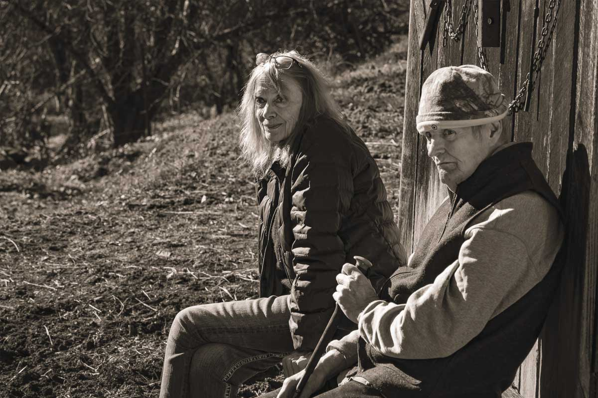 Elizabeth and George Ellison sit outside their home at lower Lands Creek. Quintin Ellison photo