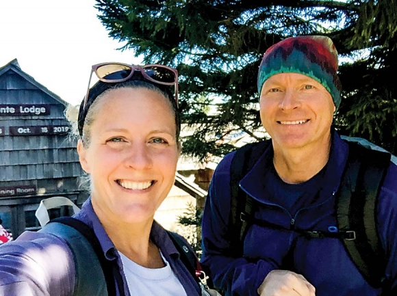 Nancy East (left) and Chris Ford pause for a photo after summiting Mt. LeConte. Donated photo