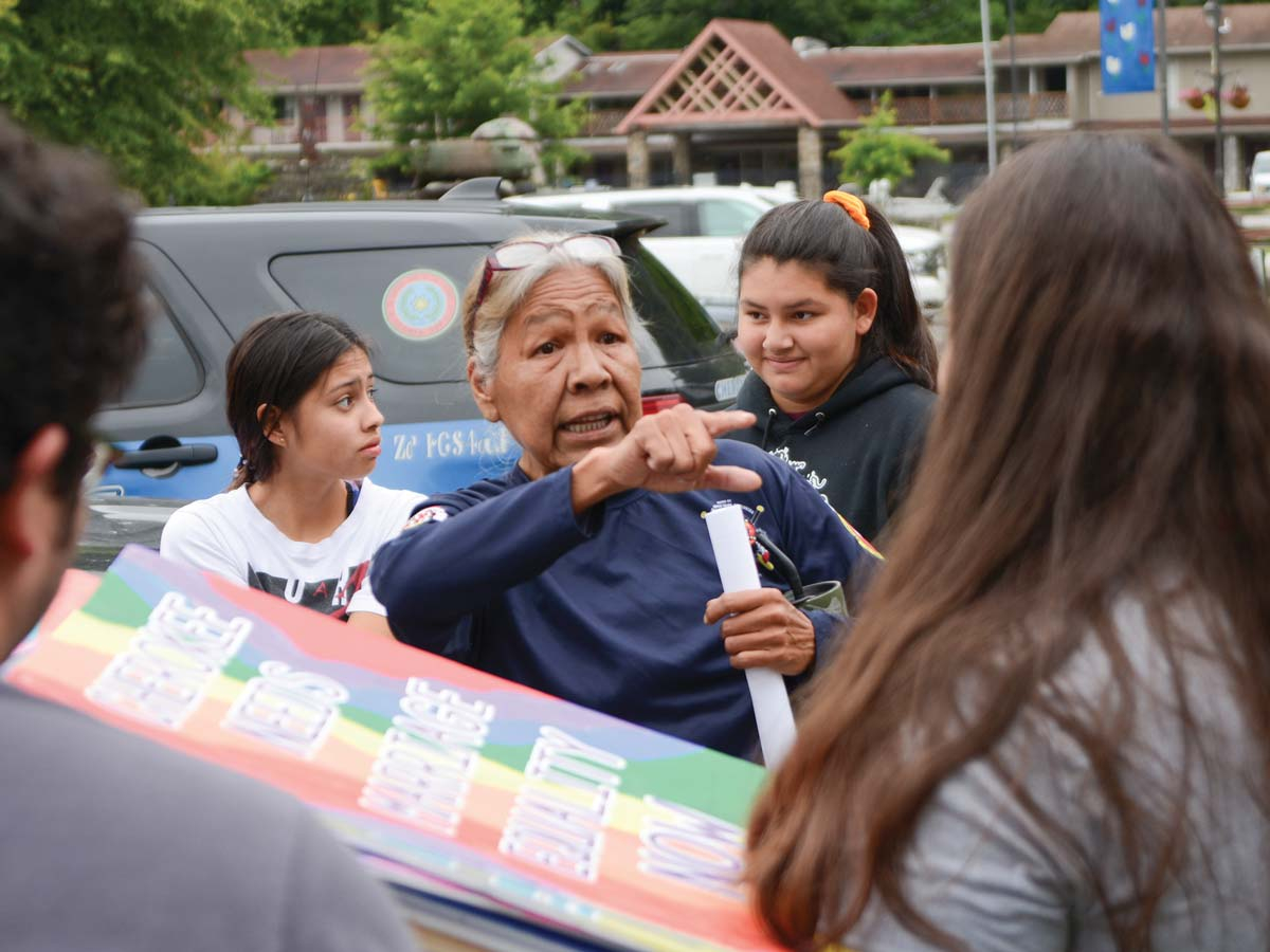 Yellowhill community member Mary Crowe speaks with LGBTQ advocates outside the Cherokee Council House July 8, following Tribal Council’s second refusal to consider an ordinance legalizing same-sex marriage. Holly Kays photo