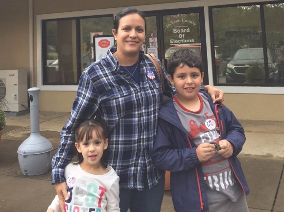 Luisa Teran de McMahan and her children, Henry and Annie, sport ‘I voted’ stickers following McMahan’s first trip to the polls as an American citizen. Donated photo