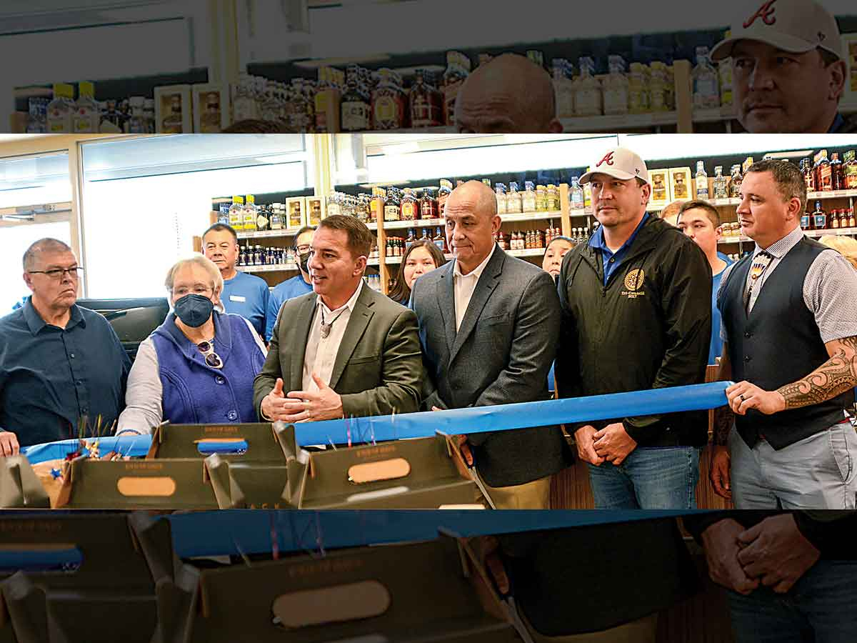 Tribal officials cut the ribbon on Cherokee&#039;s first ABC store. Holly Kays photo