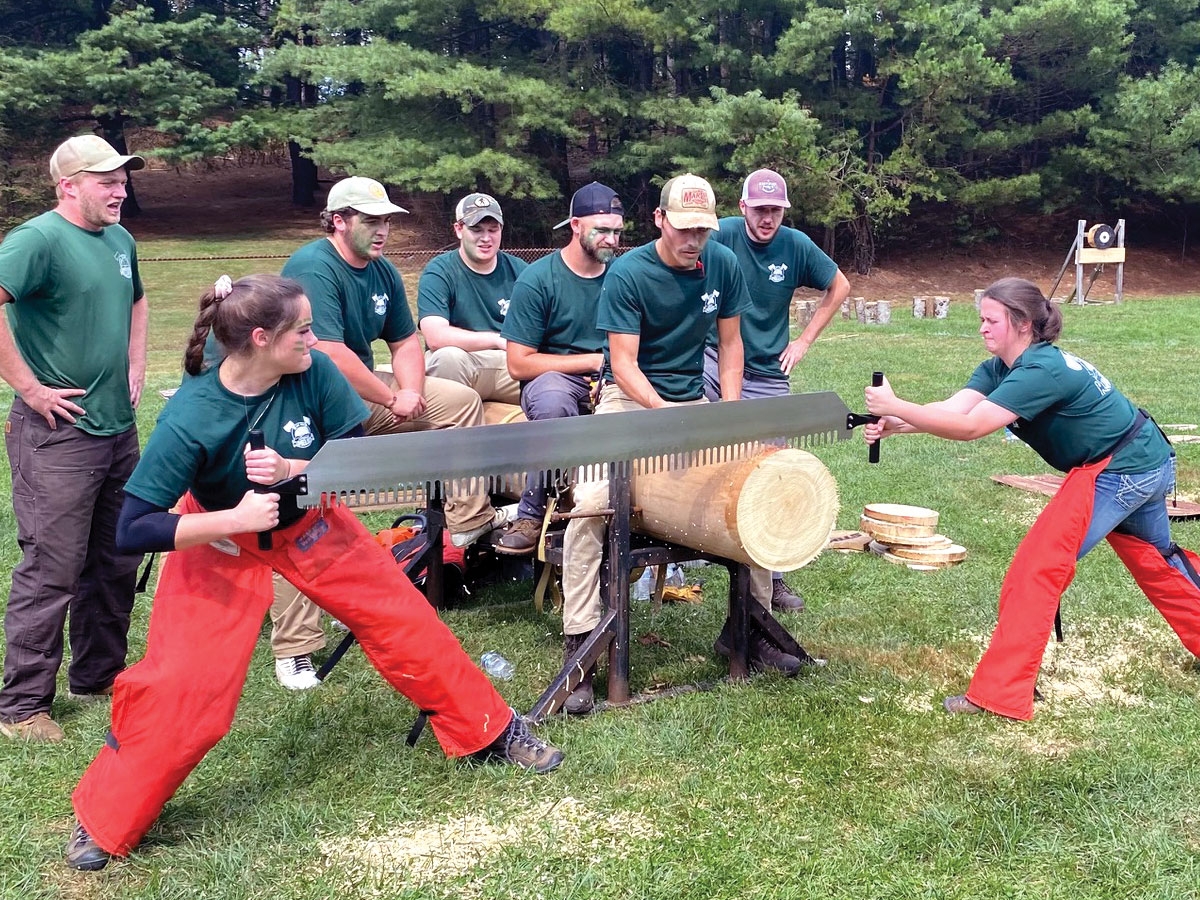 Shay Parton (left) and Olivia Hedden compete in the Jill and Jill Cross Cut event. Dr. Shelley White photo