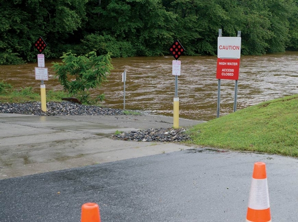 The Jackson County Greenway and boat put-in were blocked off last week due to danger from the swollen Tuckasegee River. Holly Kays photo