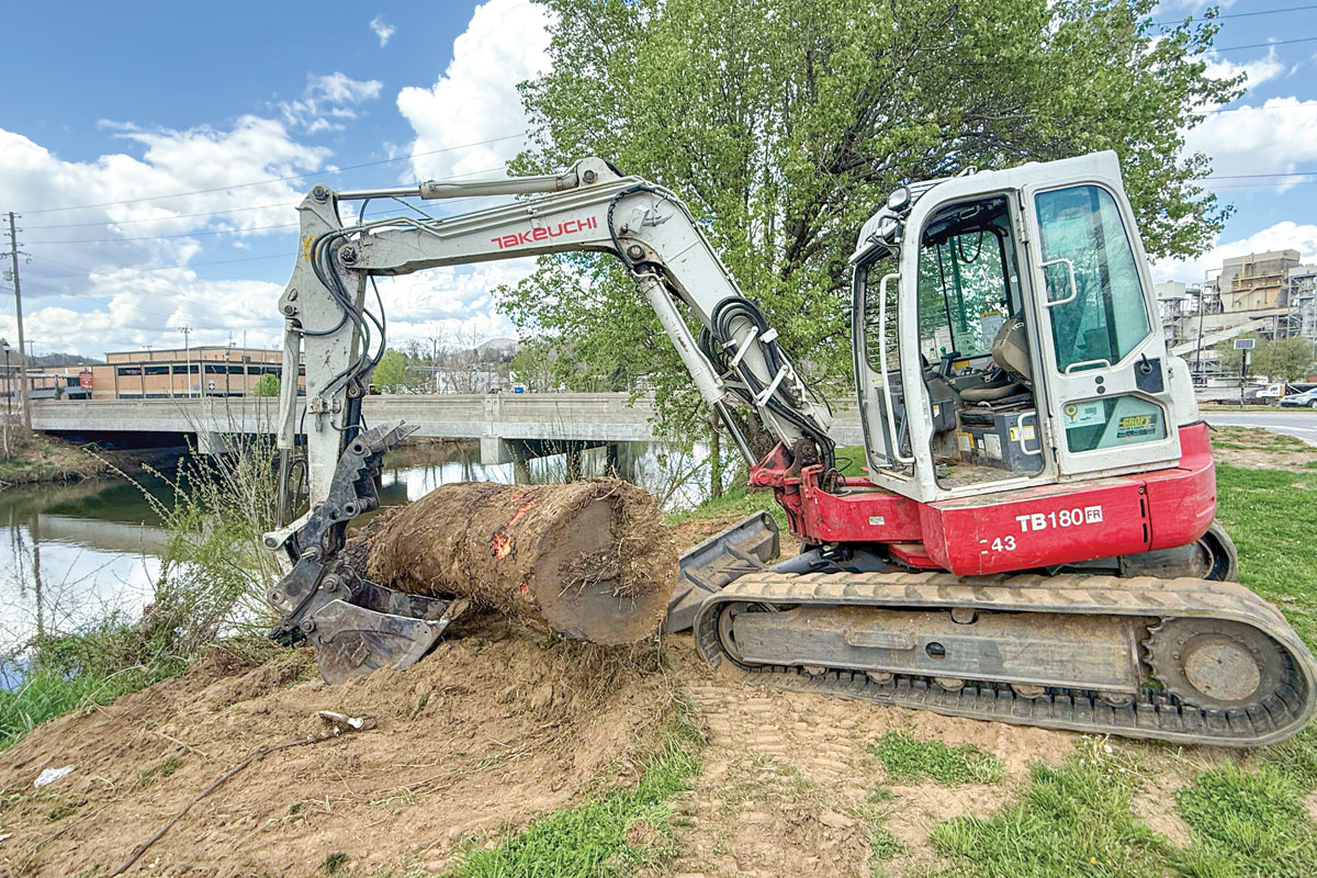 Debris removal has begun along the Pigeon River in Haywood County. Kyle Perrotti photo