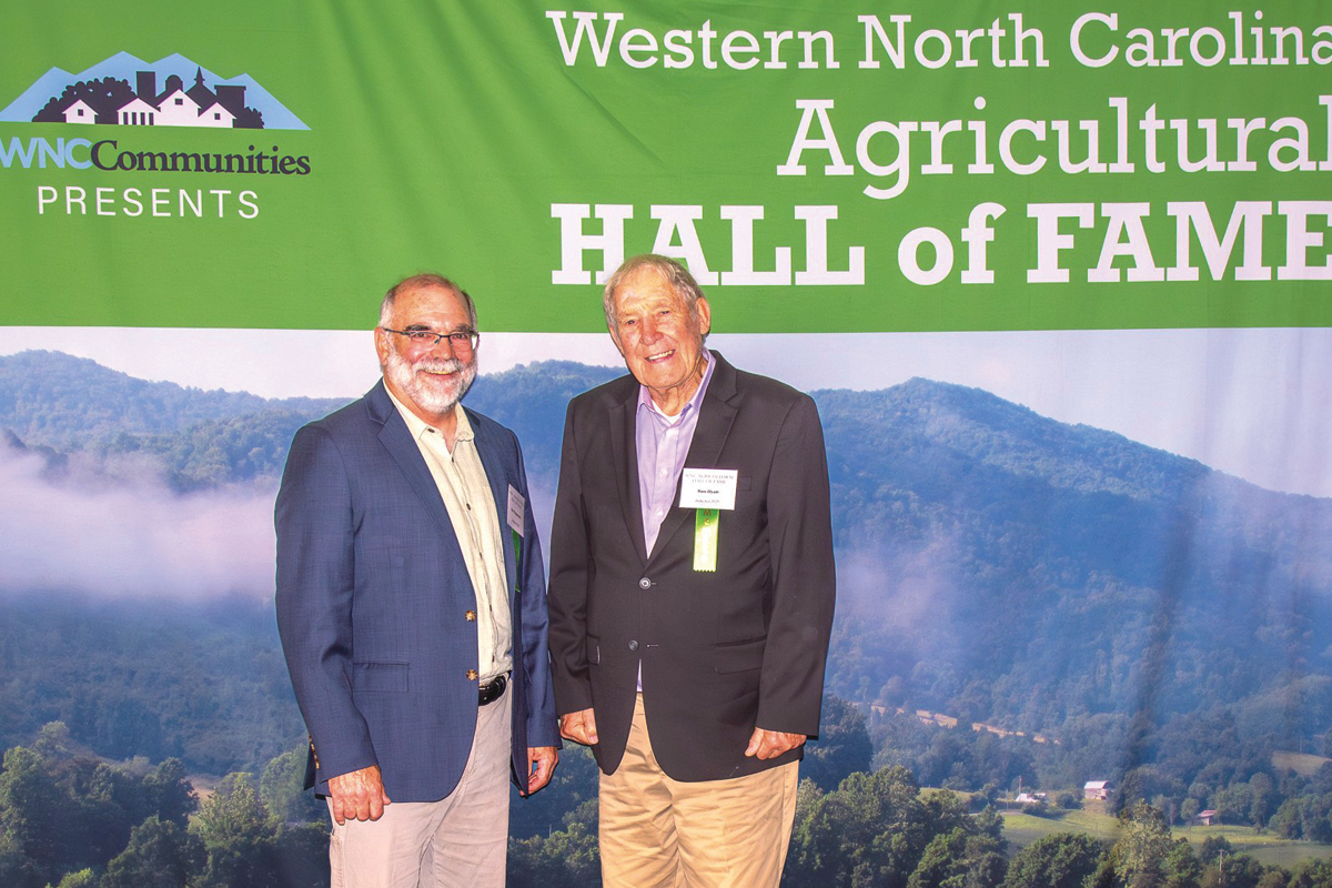 Jim Walgenbach (left) and Bass Hyatt (right) were inducted into the WNC Agricultural Hall of Fame on Aug. 8, 2025.