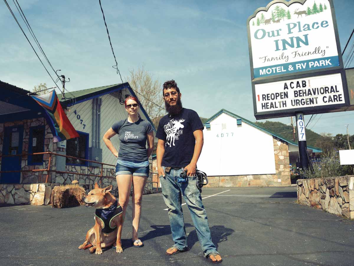 Kitty (left) and Cody Currin stand outside their Maggie Valley motel on May 24, 2021. Jeffrey Delannoy photo