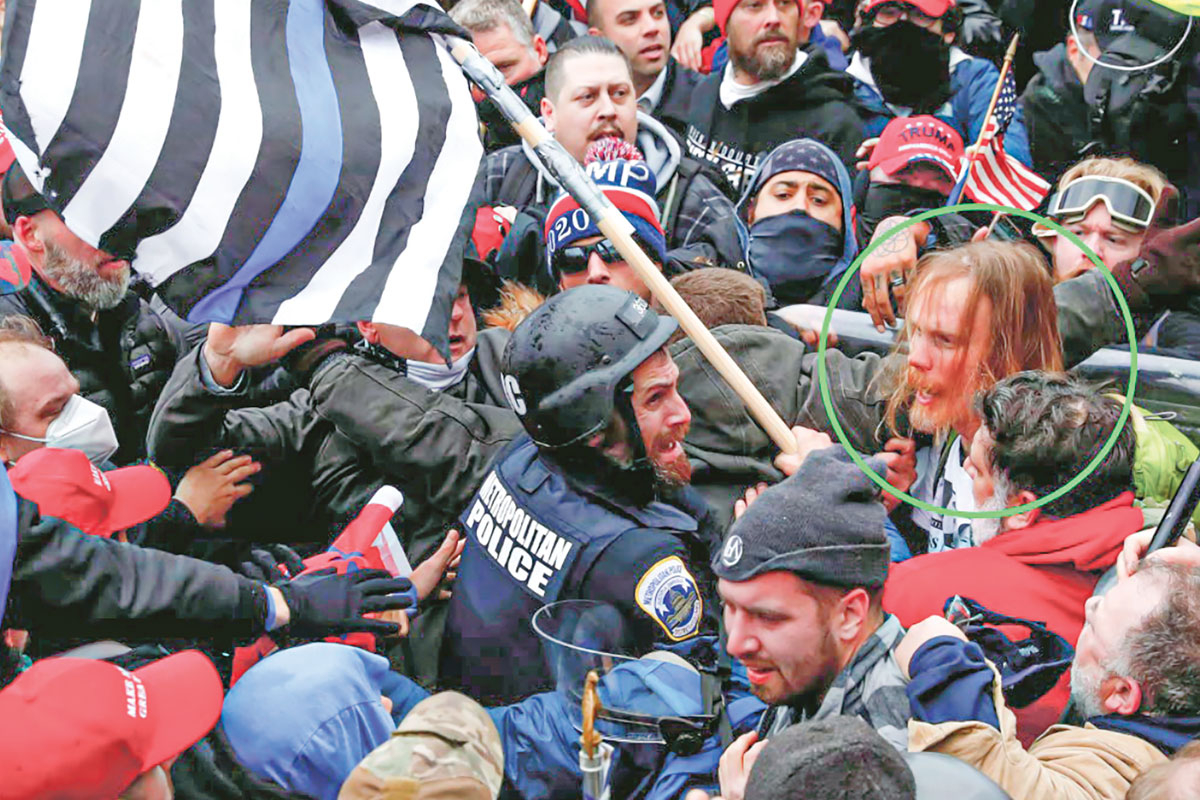 Nathan Baer is seen here near Officer Fanone in the now infamous photo. From FBI affidavit