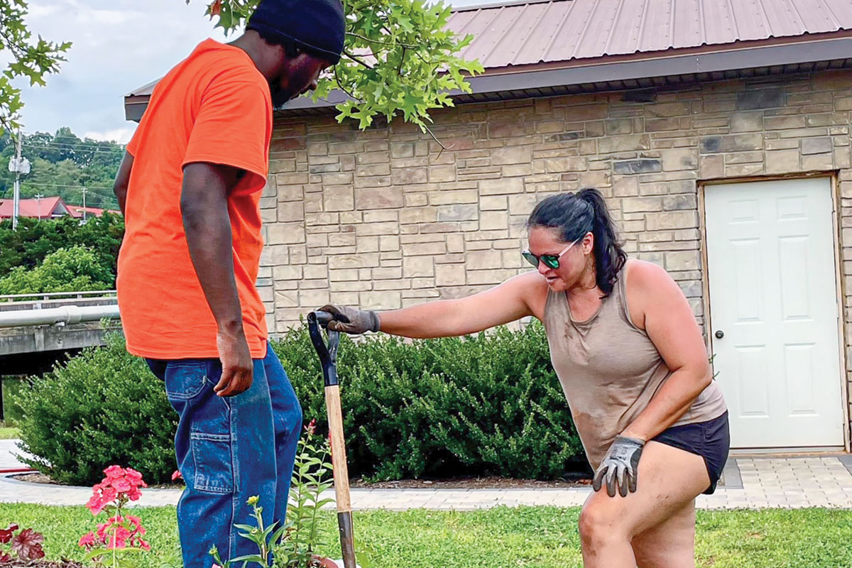 Folks worked to complete the native plant garden on June 26. Donated photo