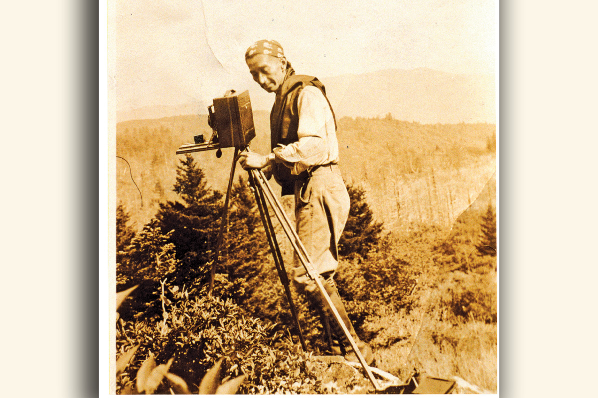 George Masa sets up for a shot at Shining Rock in 1931. Courtesy of the North Carolina Collection, Pack Memorial Library, Asheville