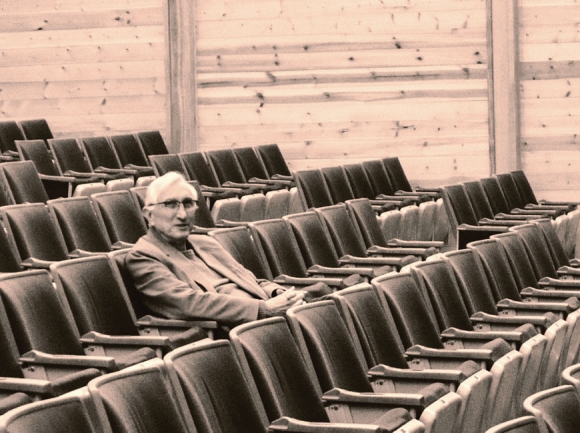 Haywood Arts Regional Theatre Executive Director Steven Lloyd sitting in the seats of the Performing Arts Center building in Waynesville. Garret K. Woodward