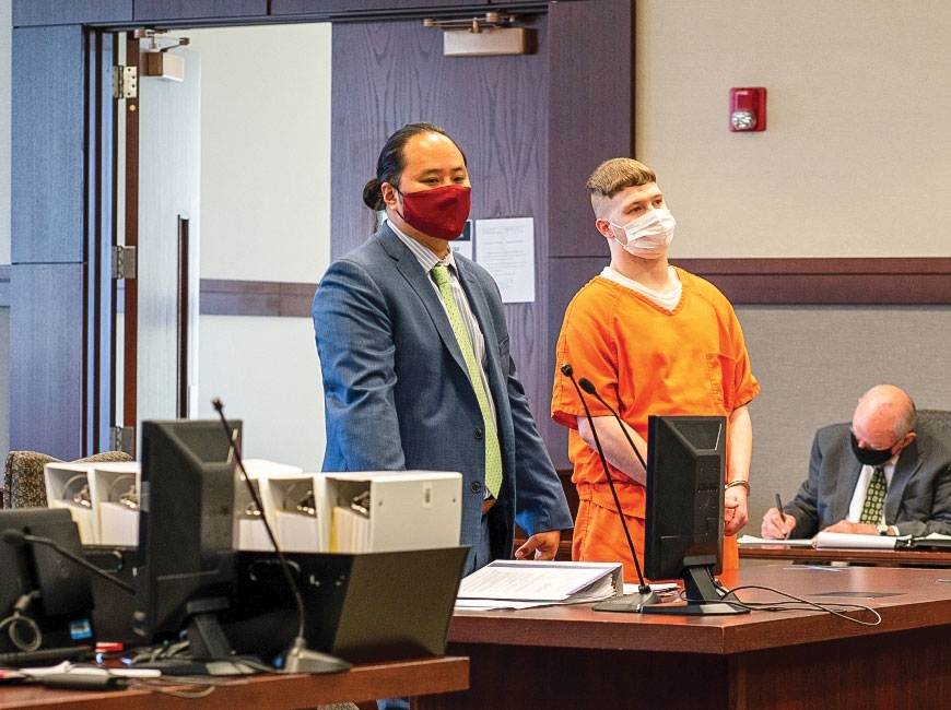 Defense attorney Joshua Nielsen of Waynesville (L) stands today (Friday, Oct. 29) beside Dylan Green, during a Rule 24 hearing in Haywood County Superior Court.