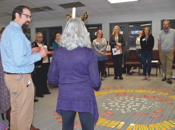 A group of Haywood County educators participate in an activity during a recent staff development training offered by the Haywood NAACP Chapter. Jessi Stone photo