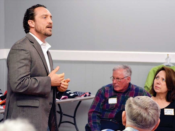 Chris Gaubatz (left) speaks to a group of Haywood Republicans Feb. 19. Cory Vaillancourt photo