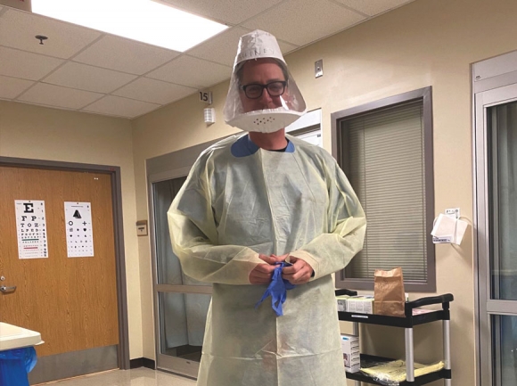 Dr. Ben Guiney prepares for a shift in the emergency room at Harris Regional Hospital. Donated photo