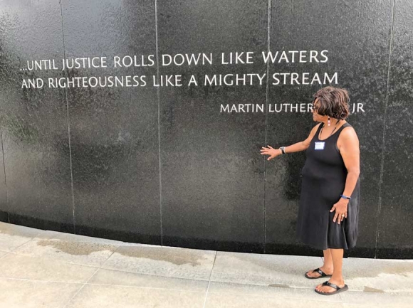 Marsha Miller stands next to a civil rights monument in Montgomery. Donated photo