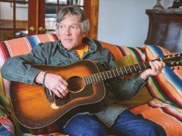 Singer-songwriter Chris Minick at his home in Waynesville. Garret K. Woodward photo