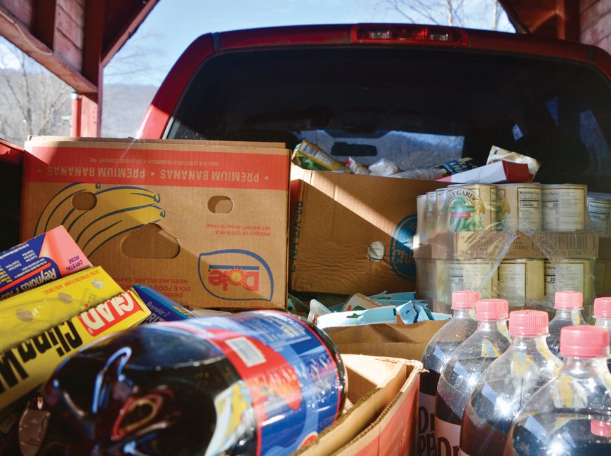 The back of Beverly Banks’ big red truck is full of groceries donated to the Open Door, in Frog Level. Cory Vaillancourt photo 