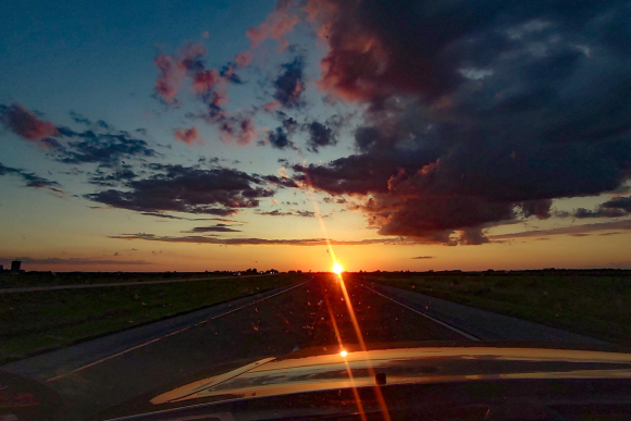 Interstate 64 in rural Illinois at sunset.