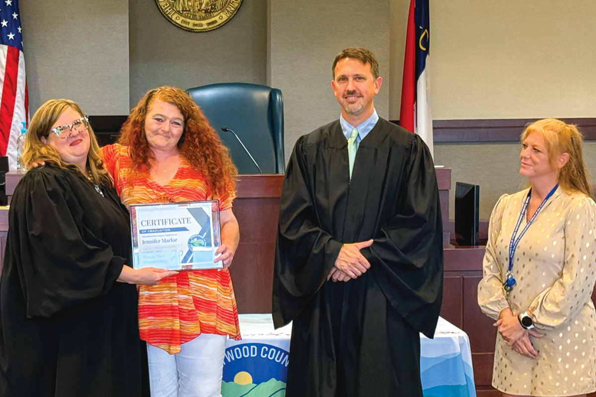 Jennifer received her certificate from Judge Monica Leslie, Judge Justin Greene and Program Coordinator Amanda Seay. Kyle Perrotti photo