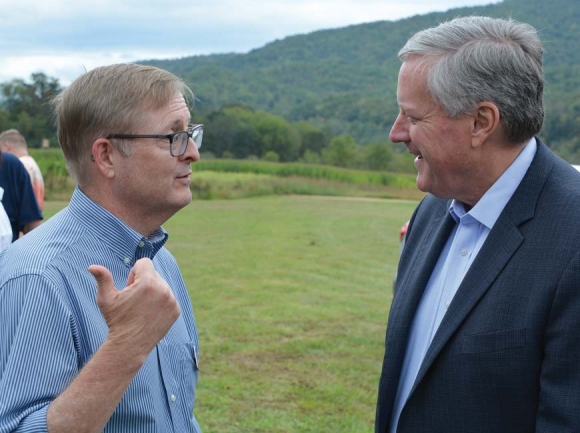Judicial candidate Jim Moore (left) talks with Rep. Mark Meadows Oct. 12 at a Swain County GOP fundraiser. Cory Vaillancourt photo. 