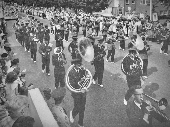 Sponsored by the Canton Lions Club, the Canton High School band marches in the 1957 Canton Labor Day parade. 