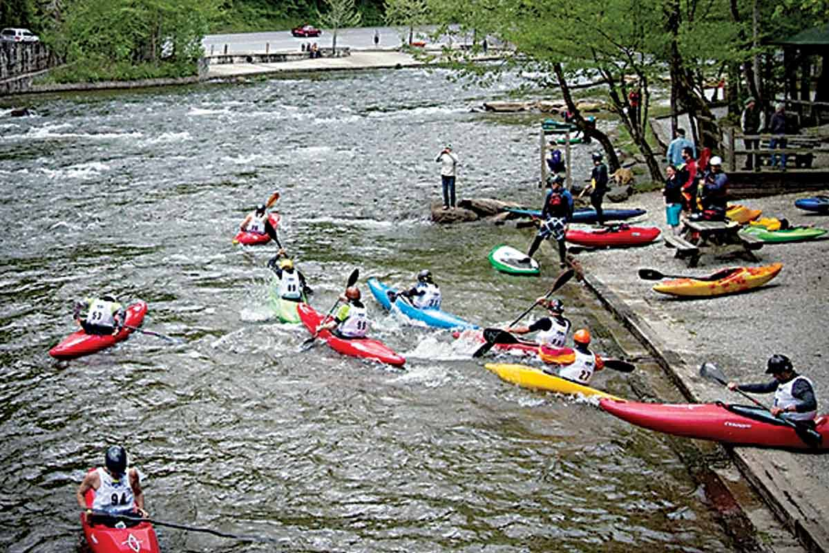 Paddlers try out kayaks at a former Spring Fling event. NOC photo 