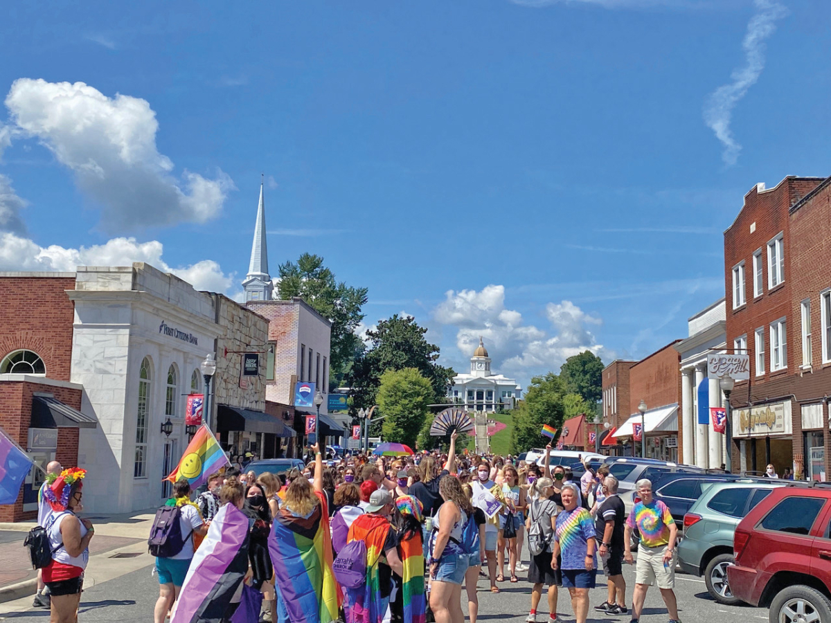 Participants march down Main Street during the inaugural Sylva Pride celebration. Hannah McLeod photo 