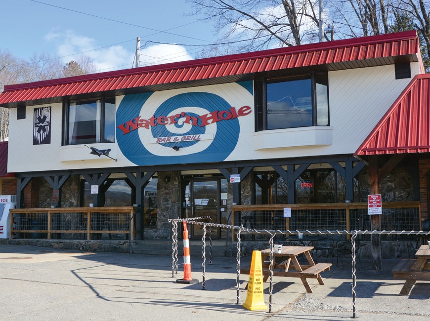 The Water’n Hole in Waynesville will soon celebrate 15 years in operation as the final frontier of the beloved ‘dive bar’ in our region. (photos: Garret K. Woodward) 