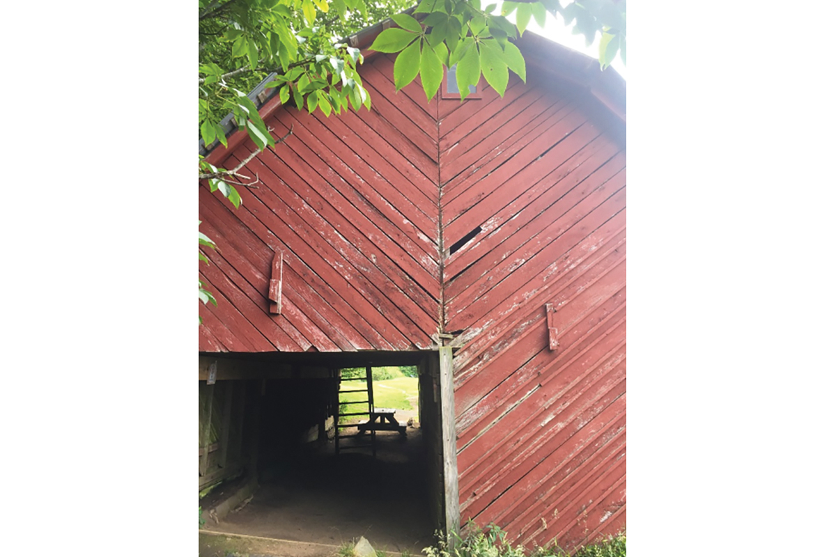 The shelter shows signs of aging  and rotting wood. U.S. Forest Service photo