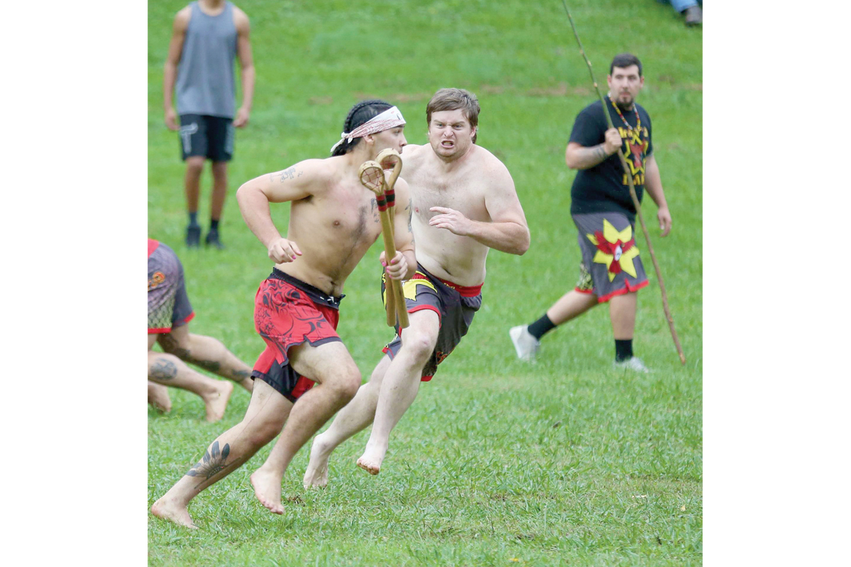 Birdtown plays Wolfetown in a stickball game during the 2021 fair week.  Jonah Lossiah/The One Feather photo