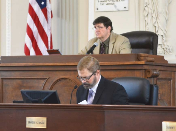 Haywood County commissioners Kevin Ensley (top) and Brandon Rogers wait for a May 4 meeting to begin. Cory Vaillancourt photo