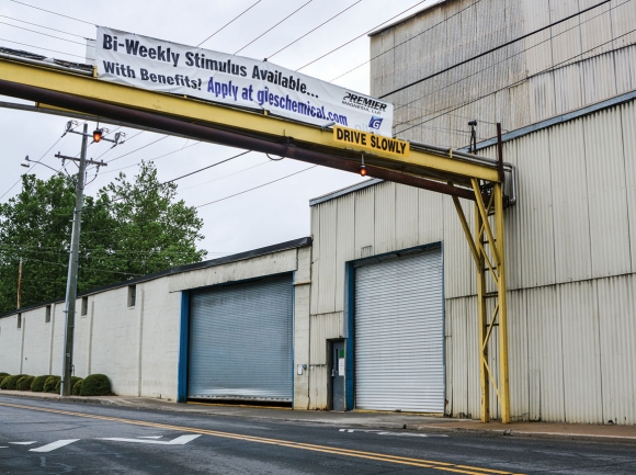 A clever sign in Frog Level announces job openings at Giles Chemical. Cory Vaillancourt photo