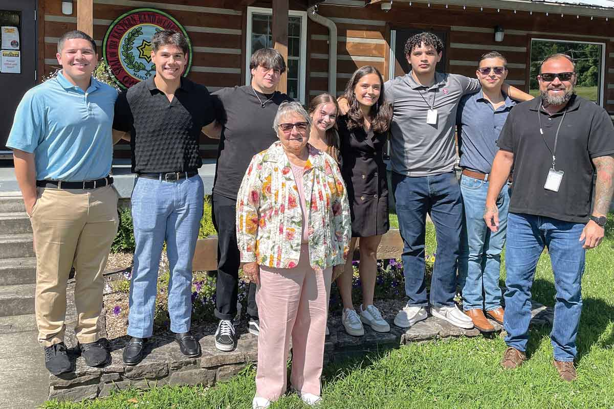The group of young adults who addressed Tribal Council July 12 stand with Constitution Committee members Ernest Tiger (far right) and Carmaleta Monteith (center). Donated photo