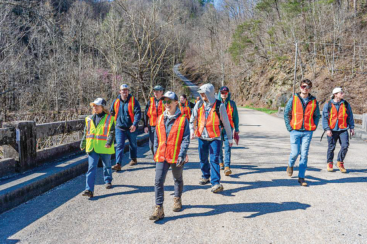 Members of Defenders of Wildlife, Wildlands Network and North Carolina Department of Transportation lead the way for students hoping to learn more about wildlife crossings. 