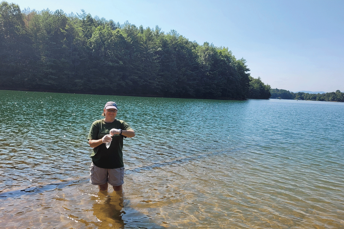 MountainTrue Western Regional Director Callie Moore takes a water sample from Lake Nottely in  Union County, Georgia. MountainTrue photo