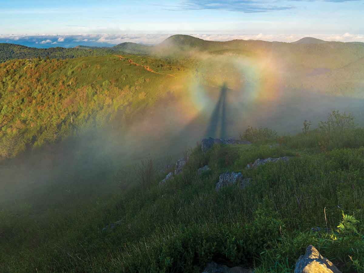 A Brocken spectre, a phenomenon that occurs when the sun is low, magnifies a shadow cast upon the upper surfaces of clouds that sit lower than the mountain from which the shadow is cast. Steve Reinhold/Appalachian Adventure Company photo