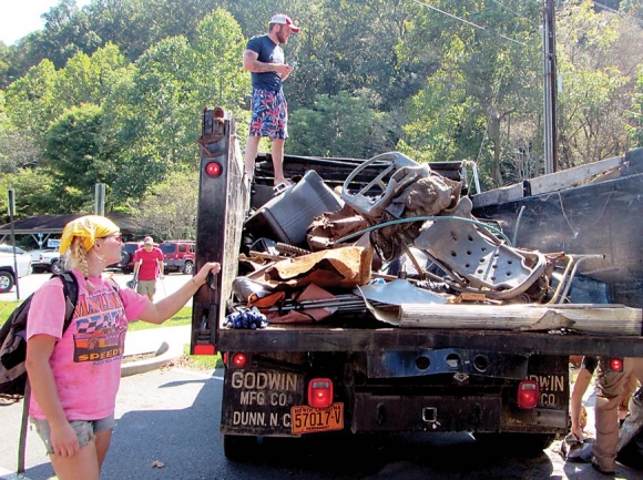 Trash removed from waterways ranges from plastic bottles to porch furniture. Donated photo