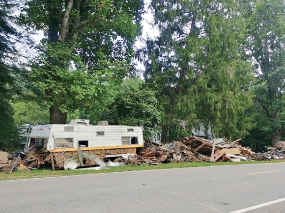 One of hundreds of piles of debris left on the side of the road in Cruso following the massive floodwaters two weeks ago.