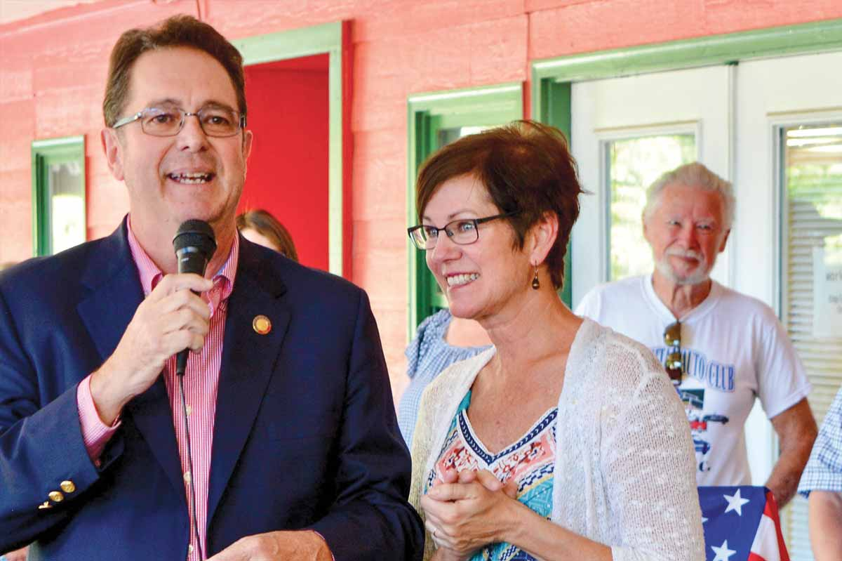 Kevin Corbin (left) speaks to Macon County Republicans in 2019 with wife Beth at his side. Cory Vaillancourt photo