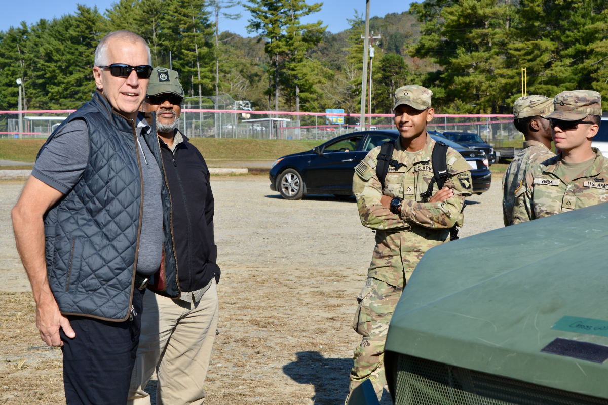 North Carolina Sen. Thom Tillis (left) speaks to soldiers of the 101st Airborne Division at the International Paper Sports Complex in Canton on Oct. 8.