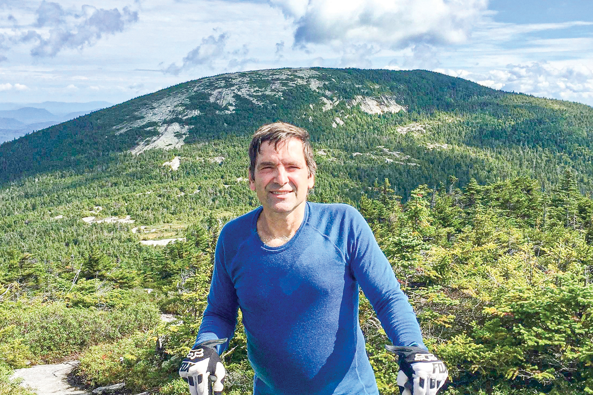 Author Peter Conti stands before Baldpate Mountain in Oxford County, Maine, near the northern end of the Appalachian Trail. Peter Conti photo