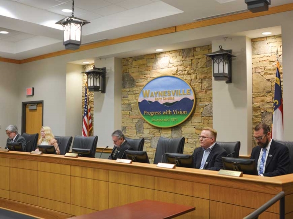 Waynesville’s newly-constituted Board of Alderman consisting of (from left) Chuck Dickson, Julia Boyd Freeman, Gary Caldwell, Jon Feichter and Anthony Sutton prepares to consider the homelessness task force. Cory Vaillancourt photo  