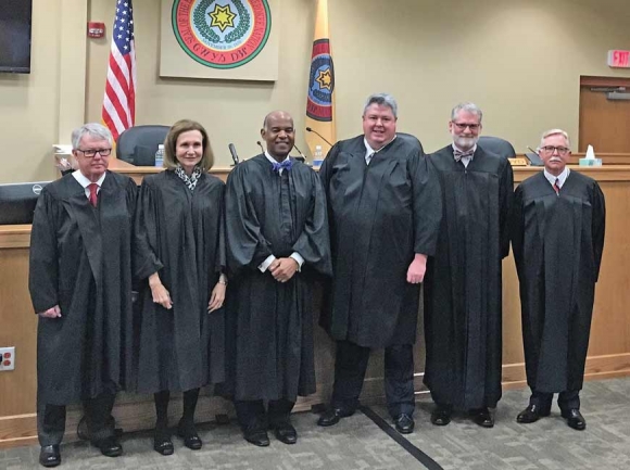 Following the session Fourth Circuit Judge Henry Floyd (from left to right), Fourth Circuit Judge Barbara Keenan, Chief Fourth Circuit Judge Roger Gregory, Cherokee Chief Justice Kirk Saunooke, Cherokee Chief Judge Thomas Cochran and Associate Cherokee Judge Randle Jones stand in the empty courtroom. Donated photo 