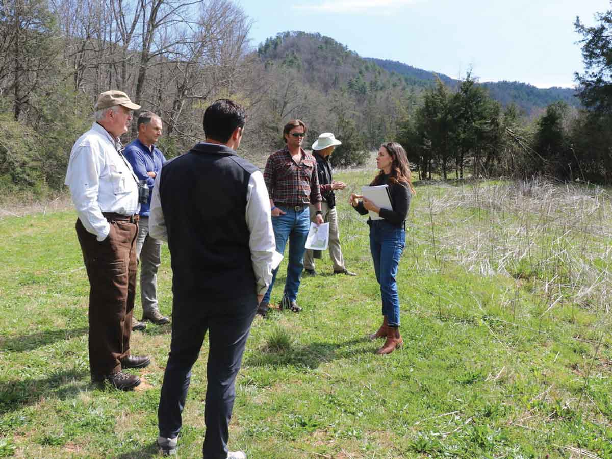 Tremont President and CEO Catey McClary and board members discuss the future of the second campus while visiting the Townsend property. Erin Rosolina photo