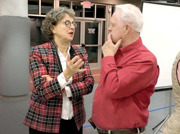 Commissioner Gayle Woody talks with Jackson County Republican Party Vice Chairman Ralph Slaughter following the Dec. 12 meeting. Nate Hadley photo