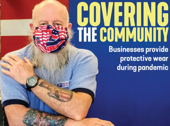 Cory Edwards, a U.S. Postal Service employee at the Waynesville Post Office, wears a mask made by a local seamstress. Mandy Wildman photo