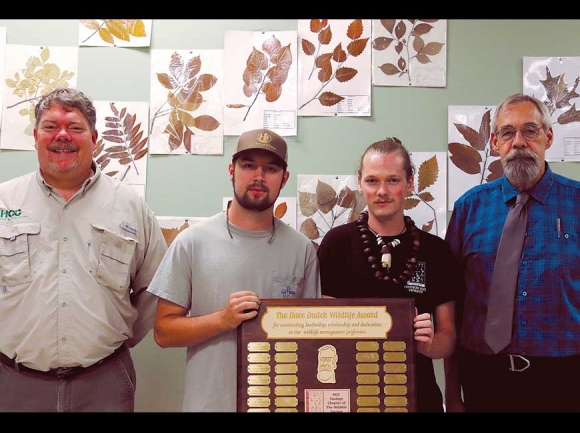 Parker Grandy (center left) and Andrew Jones  (center right) were presented the Dave Dudek Wildlife Award by fish and wildlife instructor Shannon Rabby (left) and Dave Dudek (right). Samantha Nelson photo 