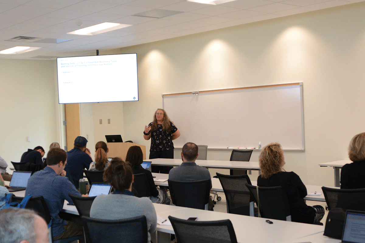 Hope Morgan speaks to a group of elected officials, municipal staff, nonprofit leaders and  planners during a June 22 flood prevention meeting at Haywood Community College. Holly Kays photo