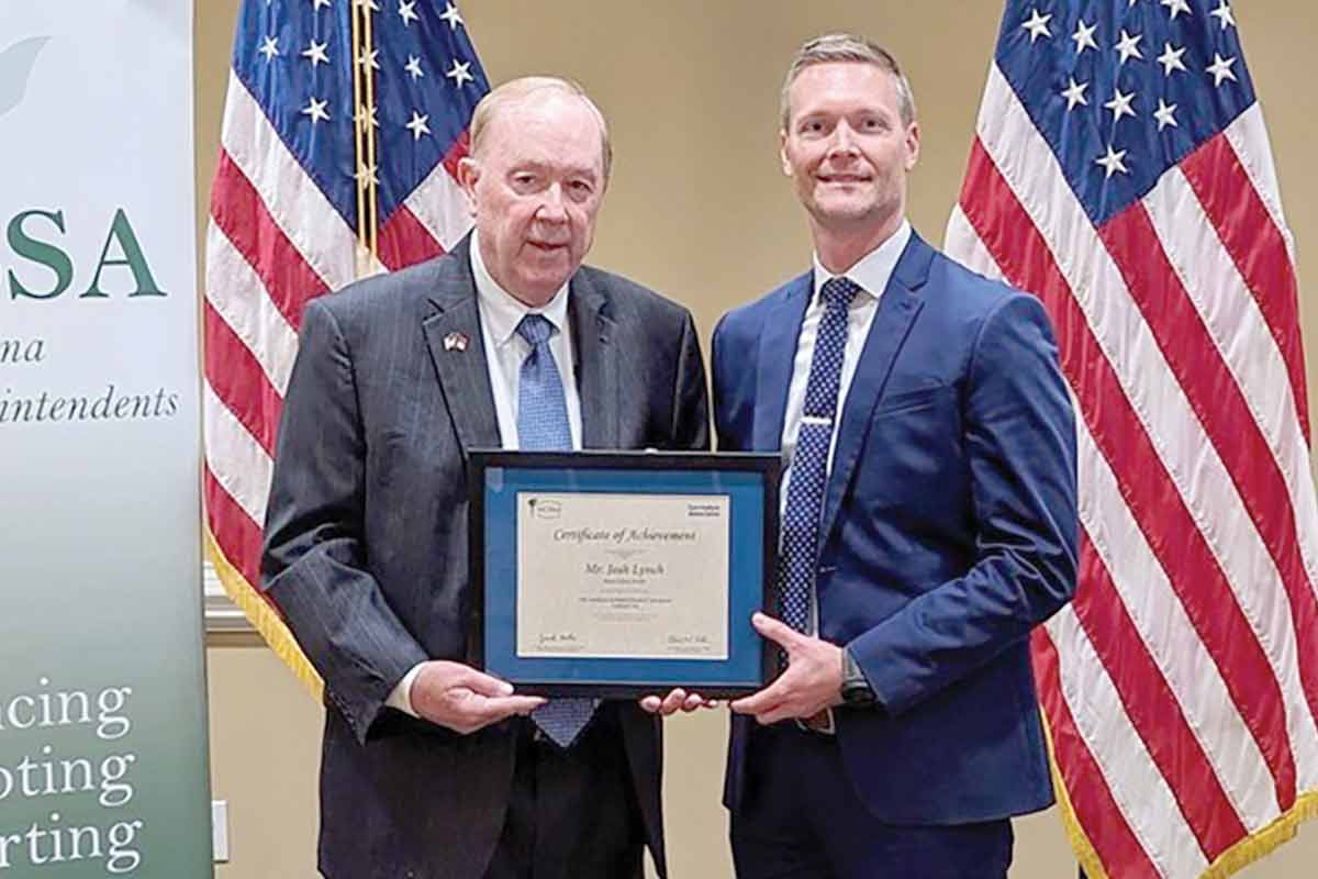 Josh Lynch, right, graduated from the NCSSA Aspiring Superintendent Program in April.