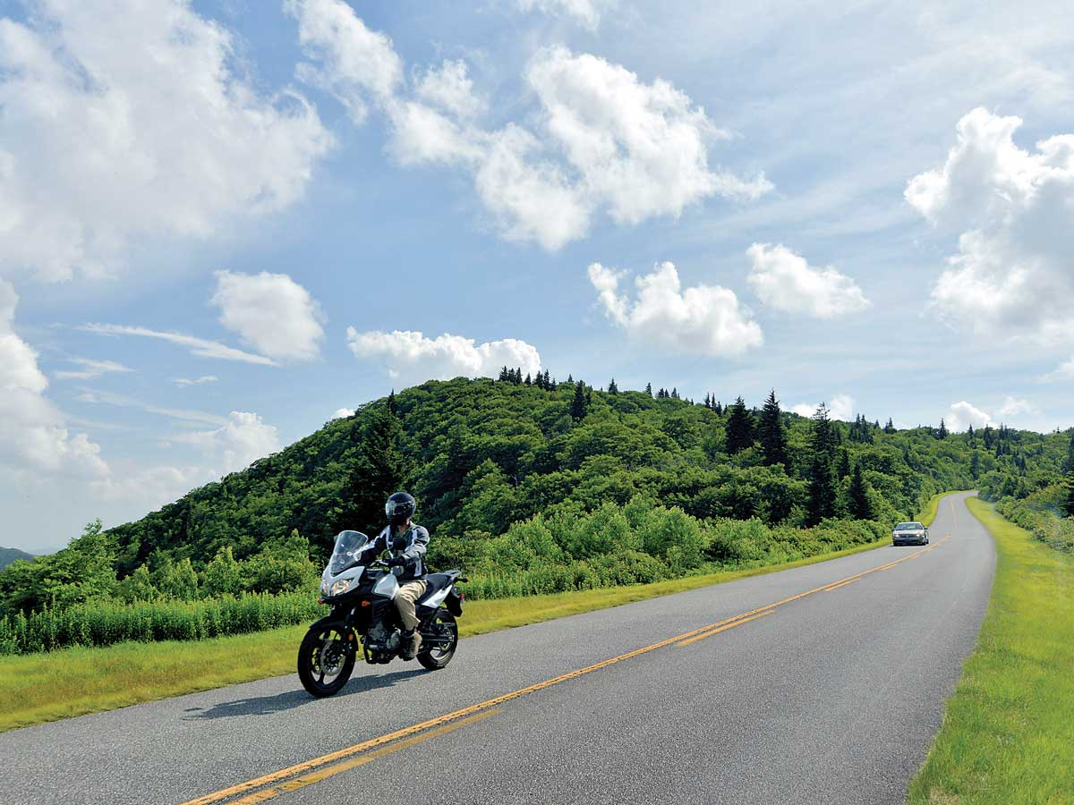 A motorcyclist cruises the Blue Ridge Parkway near Mt. Pisgah. NPS/A. Armstrong photo